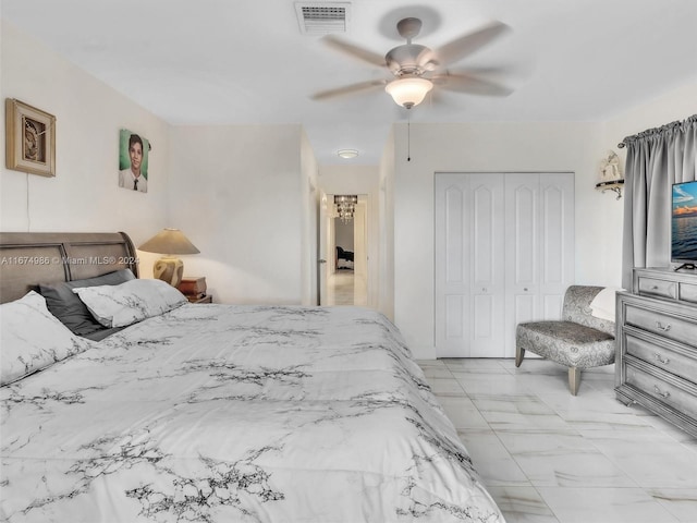 bedroom with a closet and ceiling fan