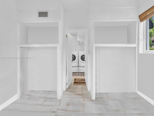 laundry area featuring independent washer and dryer