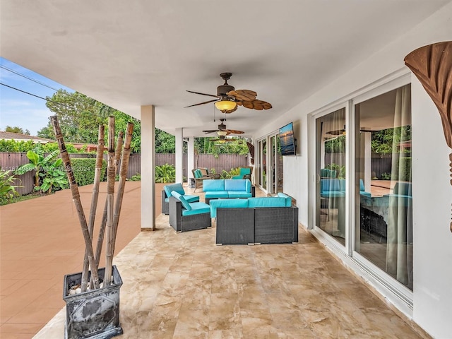 view of patio / terrace featuring an outdoor living space and ceiling fan