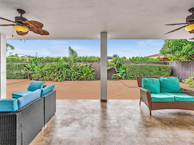 view of patio featuring outdoor lounge area and ceiling fan