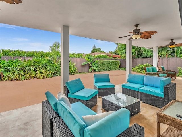 view of patio / terrace featuring ceiling fan and an outdoor living space