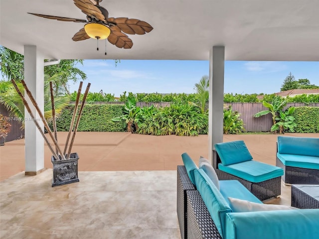 view of patio featuring ceiling fan and an outdoor living space