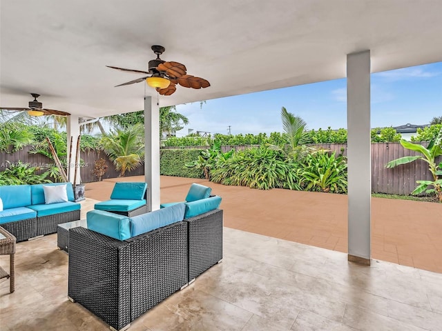 view of patio / terrace featuring ceiling fan and an outdoor living space