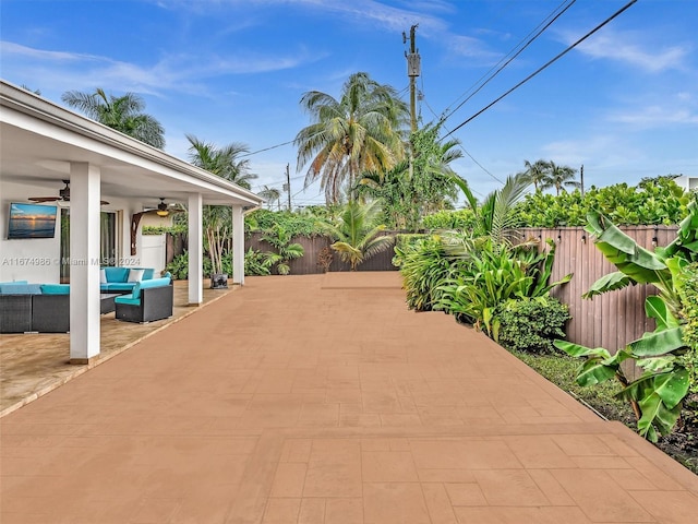 view of patio / terrace featuring outdoor lounge area and ceiling fan