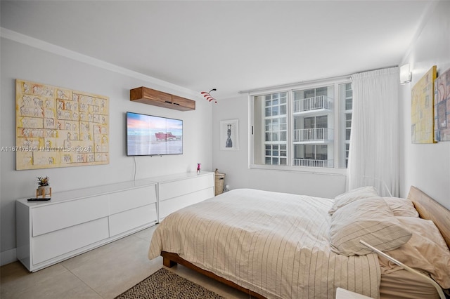bedroom with ornamental molding