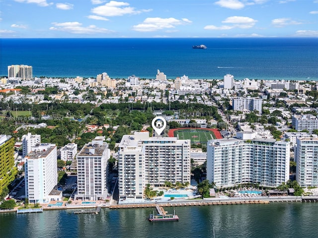 drone / aerial view with a water view and a view of city