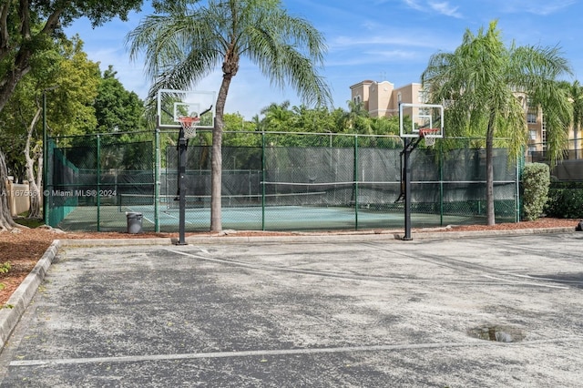 view of basketball court with tennis court