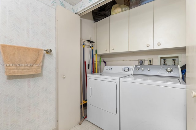 20281 E Country Club Dr Unit 1709, Aventura, FL 33180 - laundry area with cabinet space and washer and dryer