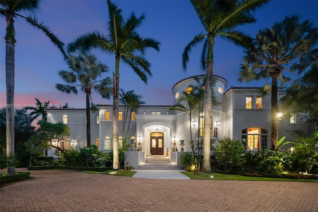 33 Arvida Pkwy, Coral Gables, FL 33156 - mediterranean / spanish-style home with french doors and stucco siding