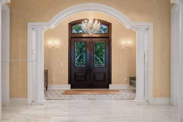 property entrance featuring french doors