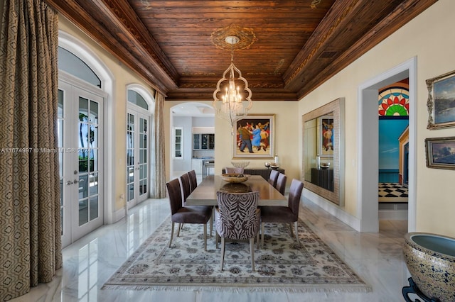 33 Arvida Pkwy, Coral Gables, FL 33156 - dining area with a chandelier, french doors, wooden ceiling, ornamental molding, and marble tiled floors