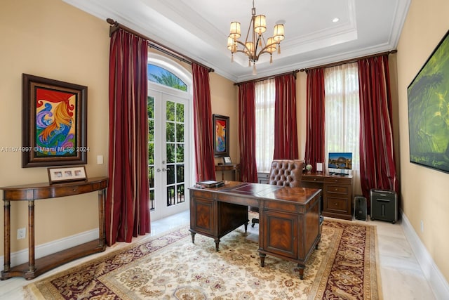 office featuring a notable chandelier, ornamental molding, and a raised ceiling