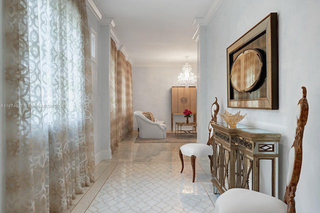 corridor with ornamental molding and an inviting chandelier