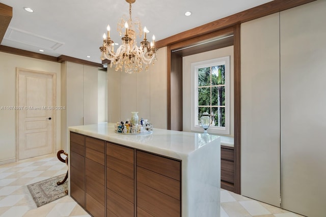 interior space with a notable chandelier and pendant lighting