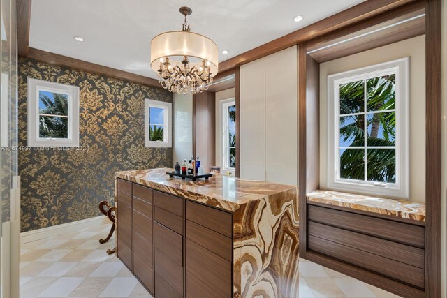 33 Arvida Pkwy, Coral Gables, FL 33156 - bathroom with vanity, a chandelier, baseboards, tile patterned floors, and recessed lighting