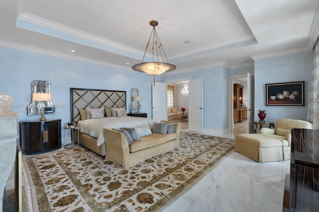 bedroom with crown molding and a raised ceiling