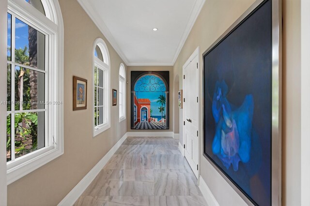 33 Arvida Pkwy, Coral Gables, FL 33156 - corridor with baseboards, light marble finish floors, and crown molding