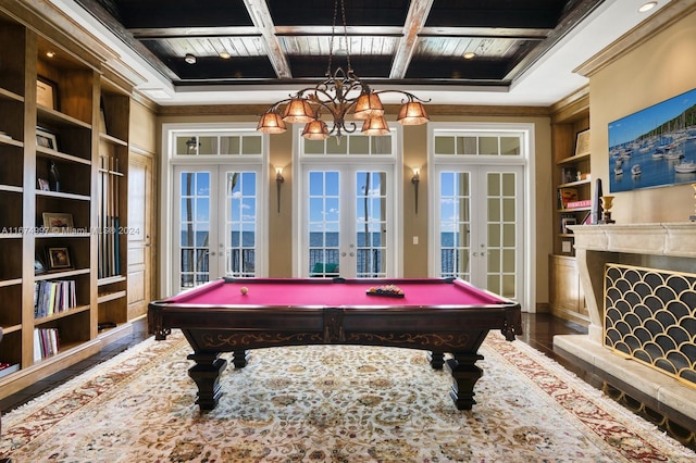 33 Arvida Pkwy, Coral Gables, FL 33156 - playroom with french doors, coffered ceiling, crown molding, billiards table, and a chandelier