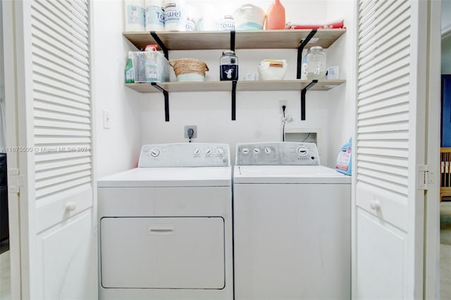 laundry area with washer and dryer