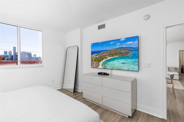 bedroom featuring hardwood / wood-style flooring