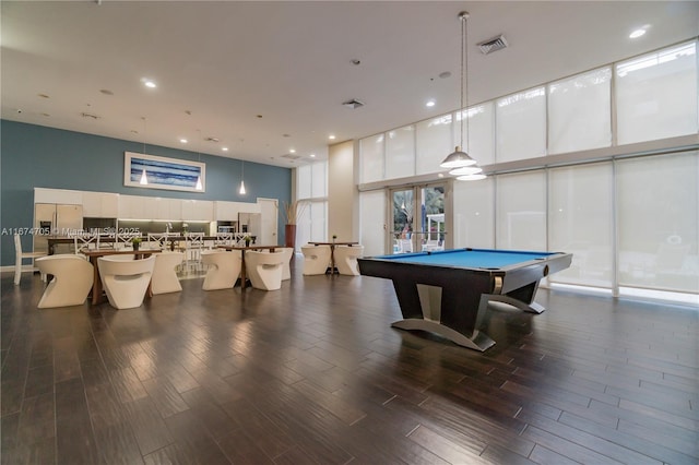 recreation room with expansive windows, a healthy amount of sunlight, and pool table