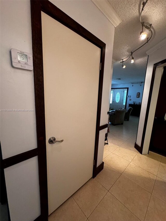 bathroom featuring vanity and tile walls