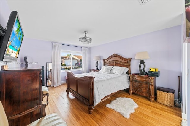 bedroom featuring light hardwood / wood-style floors