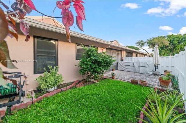 8094 Songbird Ter Unit 8094, Boca Raton, FL 33496 - view of yard featuring a patio area
