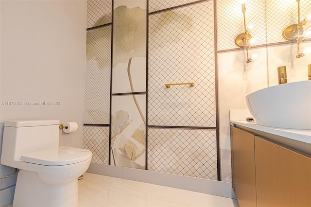 bathroom featuring tile patterned flooring and toilet