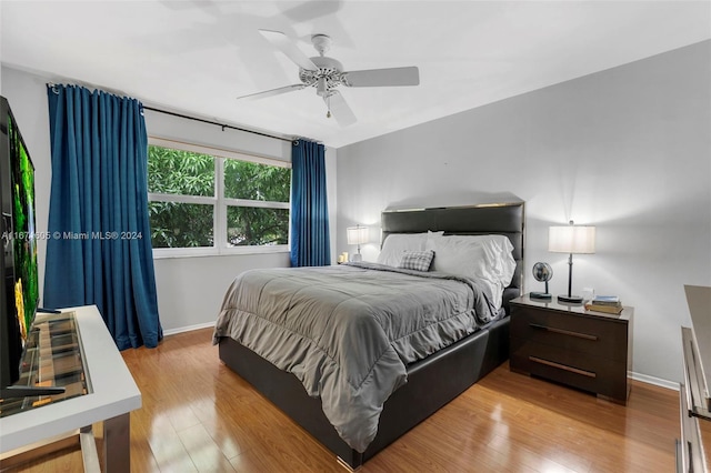 bedroom featuring ceiling fan and light hardwood / wood-style floors