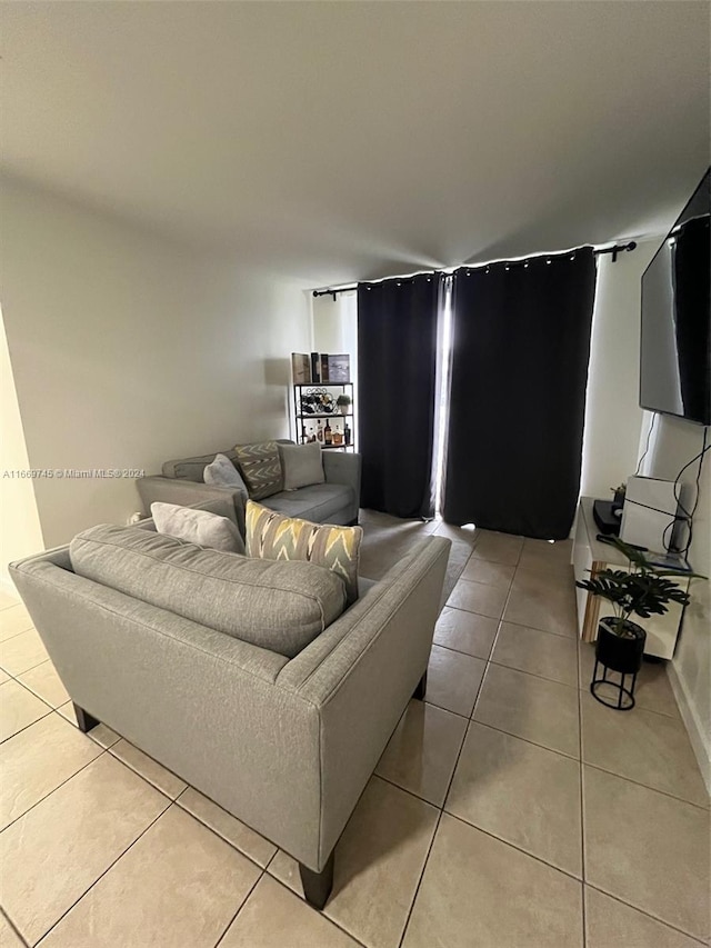 living room with light tile patterned floors