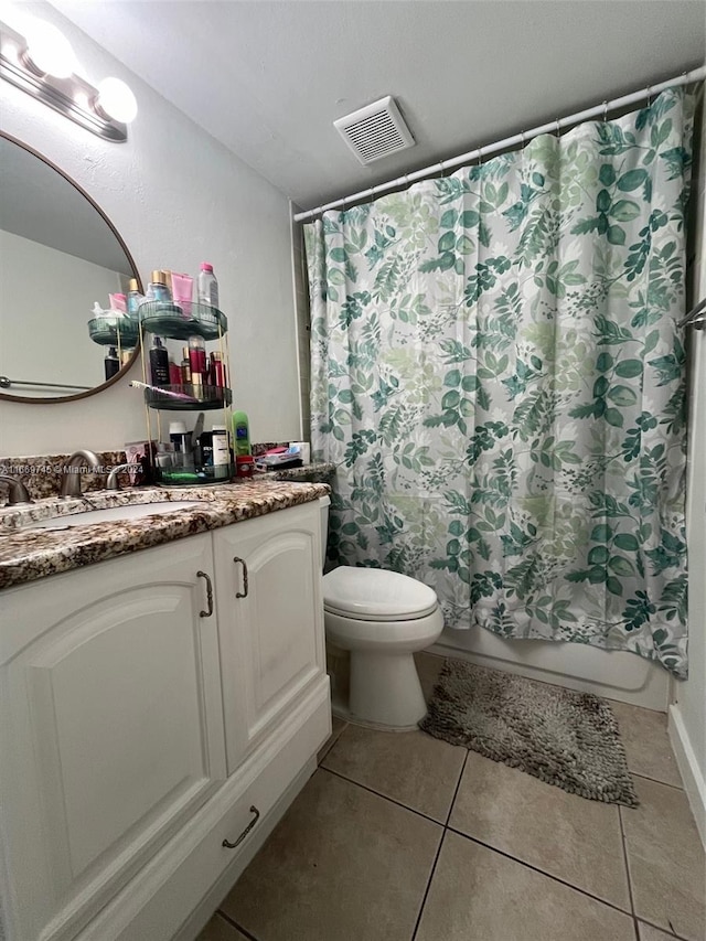 full bathroom with shower / bath combination with curtain, vanity, toilet, and tile patterned floors