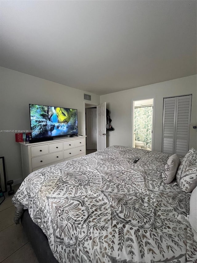 8075 NW 7th St Unit 109, Miami, FL 33126 - bedroom featuring tile patterned floors