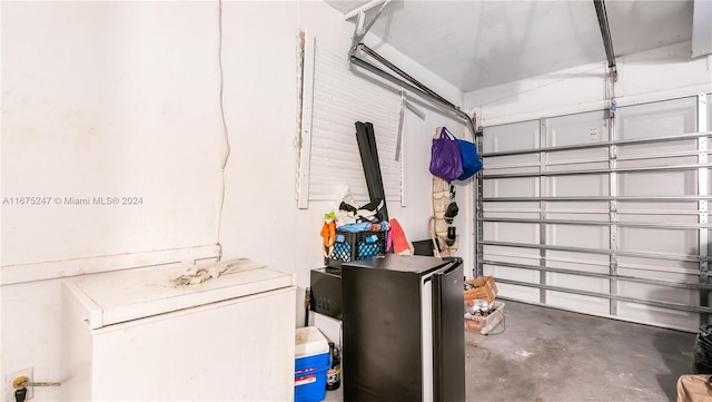 garage featuring refrigerator