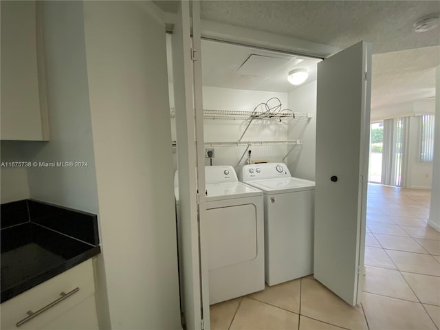 2629 SE 19th Ct Unit 103-C, Homestead, FL 33035 - clothes washing area with light tile patterned floors, laundry area, and independent washer and dryer