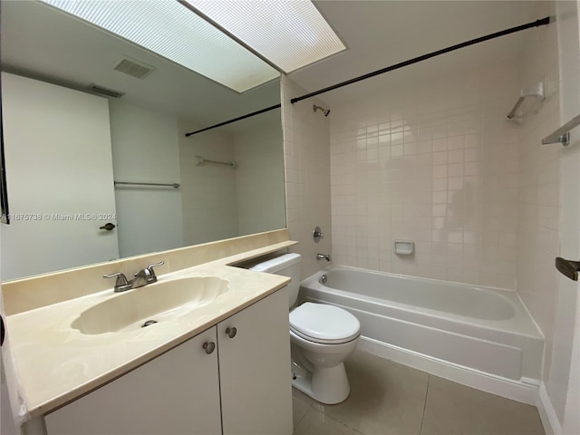 2629 SE 19th Ct Unit 103-C, Homestead, FL 33035 - full bathroom featuring washtub / shower combination, tile patterned floors, visible vents, toilet, and vanity