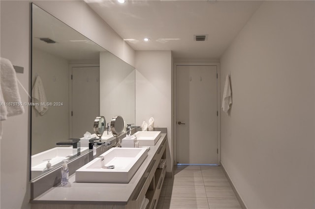 bathroom with vanity and tile patterned flooring