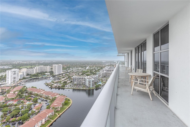 balcony featuring a water view