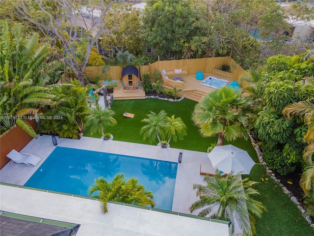 view of swimming pool featuring a wooden deck