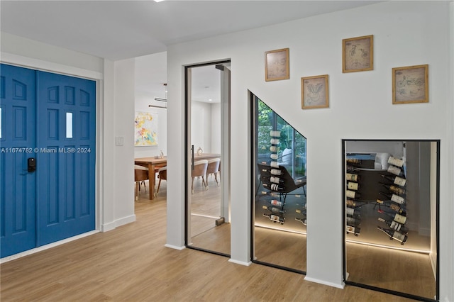 foyer with light wood-type flooring