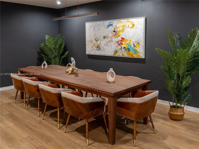 dining area featuring light wood-type flooring