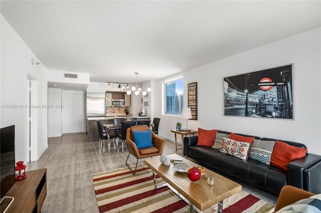 500 Brickell Ave Unit 3907, Miami, FL 33131 - living room featuring a chandelier