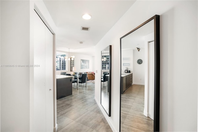 500 Brickell Ave Unit 3907, Miami, FL 33131 - hall featuring a chandelier