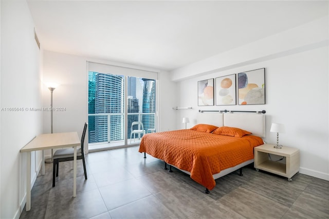 500 Brickell Ave Unit 3907, Miami, FL 33131 - bedroom featuring access to exterior and baseboards