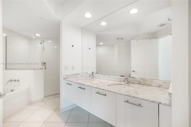 bathroom with vanity, separate shower and tub, and tile patterned floors