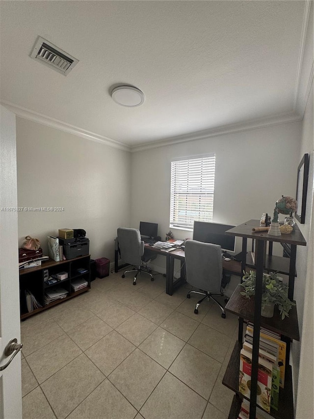 office featuring ornamental molding and light tile patterned floors