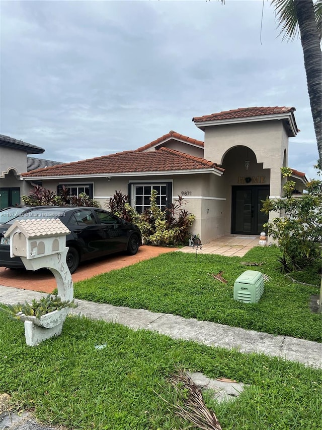 view of front of home with a front yard