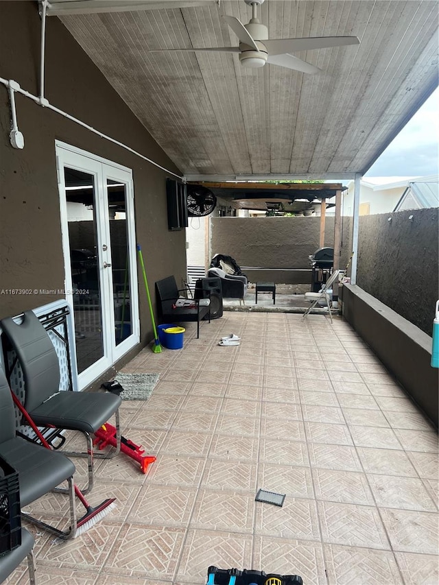 view of patio with french doors and ceiling fan