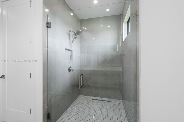 bathroom with an enclosed shower