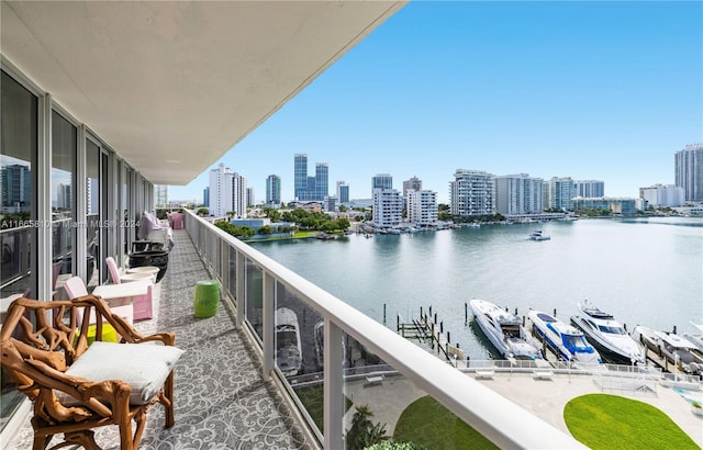 balcony featuring a water view